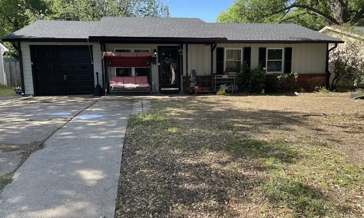 Roof Replacement crew at work on a residential roof in Nacogdoches